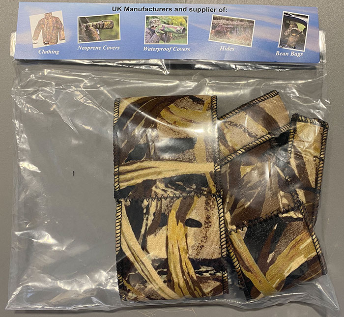 Der Neopren-&Uuml;berzug soll das Objektiv sch&uuml;tzen und das helle Wei&szlig; verdecken/tarnen. Au&szlig;erdem sch&uuml;tzt er das Objektiv vor St&ouml;&szlig;en